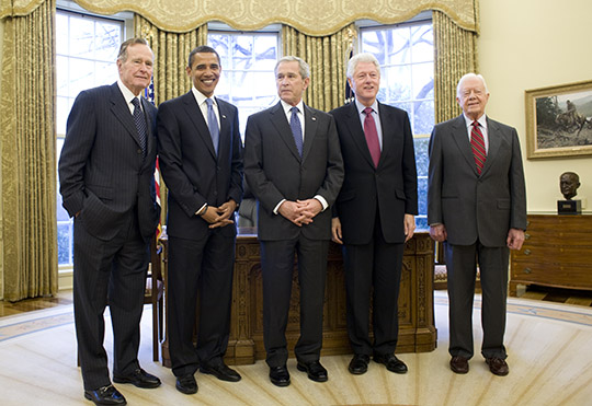Then President of the United States of America, George W. Bush invited then President-Elect Barack Obama and former Presidents George H.W. Bush, Bill Clinton, and Jimmy Carter for a Meeting and Lunch at The White House. Photo taken Wednesday, Jan. 7, 2009 in the Oval Office at The White House. (source: Wikipedia)