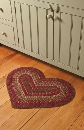 Cinnamon heart shaped braided rug